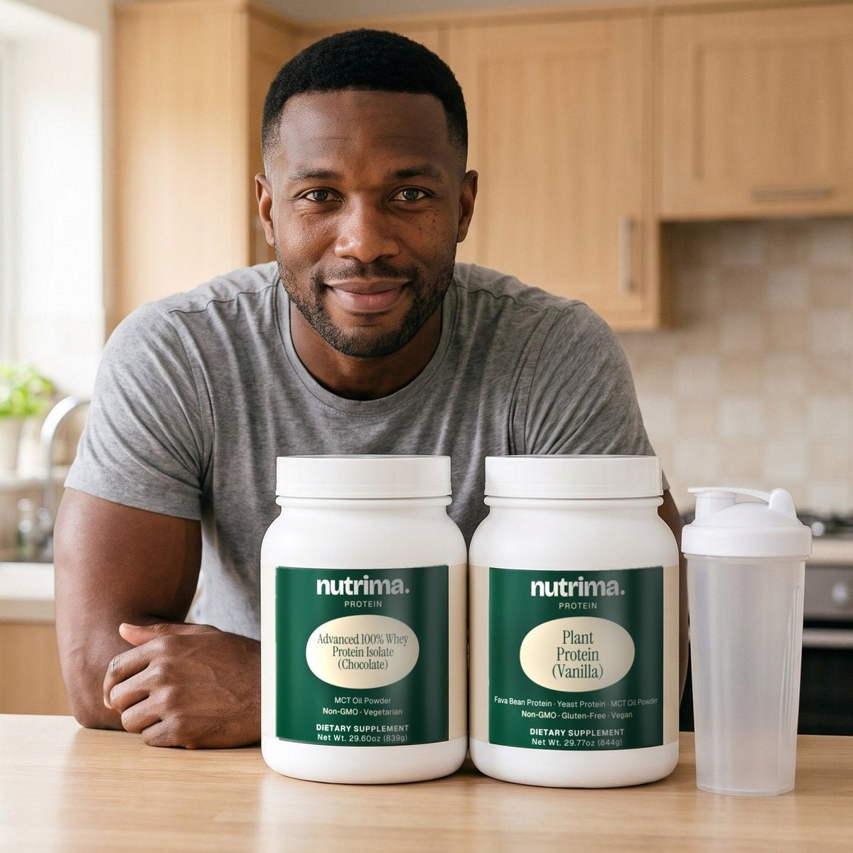 nutrima Protein collection: Advanced 100% Whey Protein Isolate and Plant Protein tubs on a kitchen counter, a man leaning behind them — AI-generated brand image