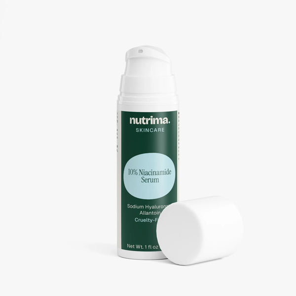 10% Niacinamide Serum in a green bottle with a white cap, set against a plain background by nutrima.