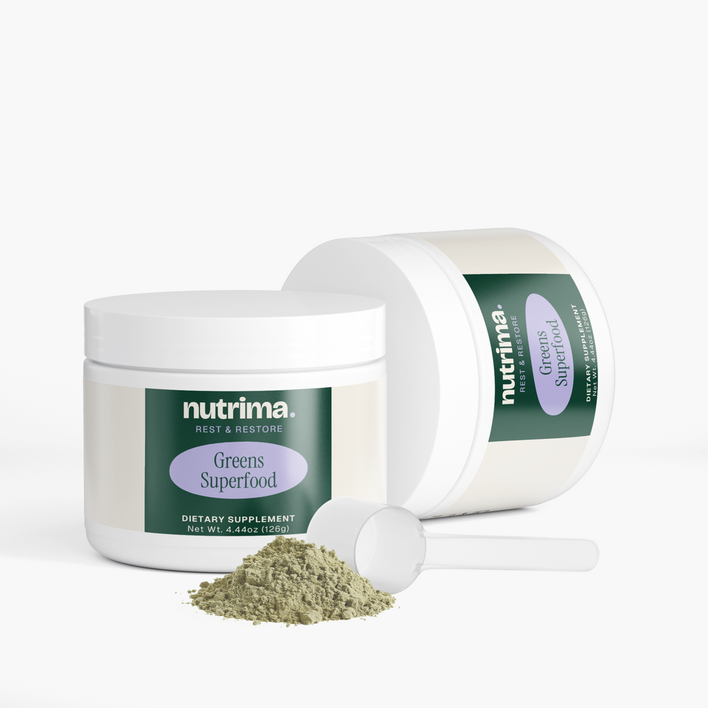 Greens Superfood powder with scoop beside the jar, showcasing its green color and distinctive packaging by nutrima.