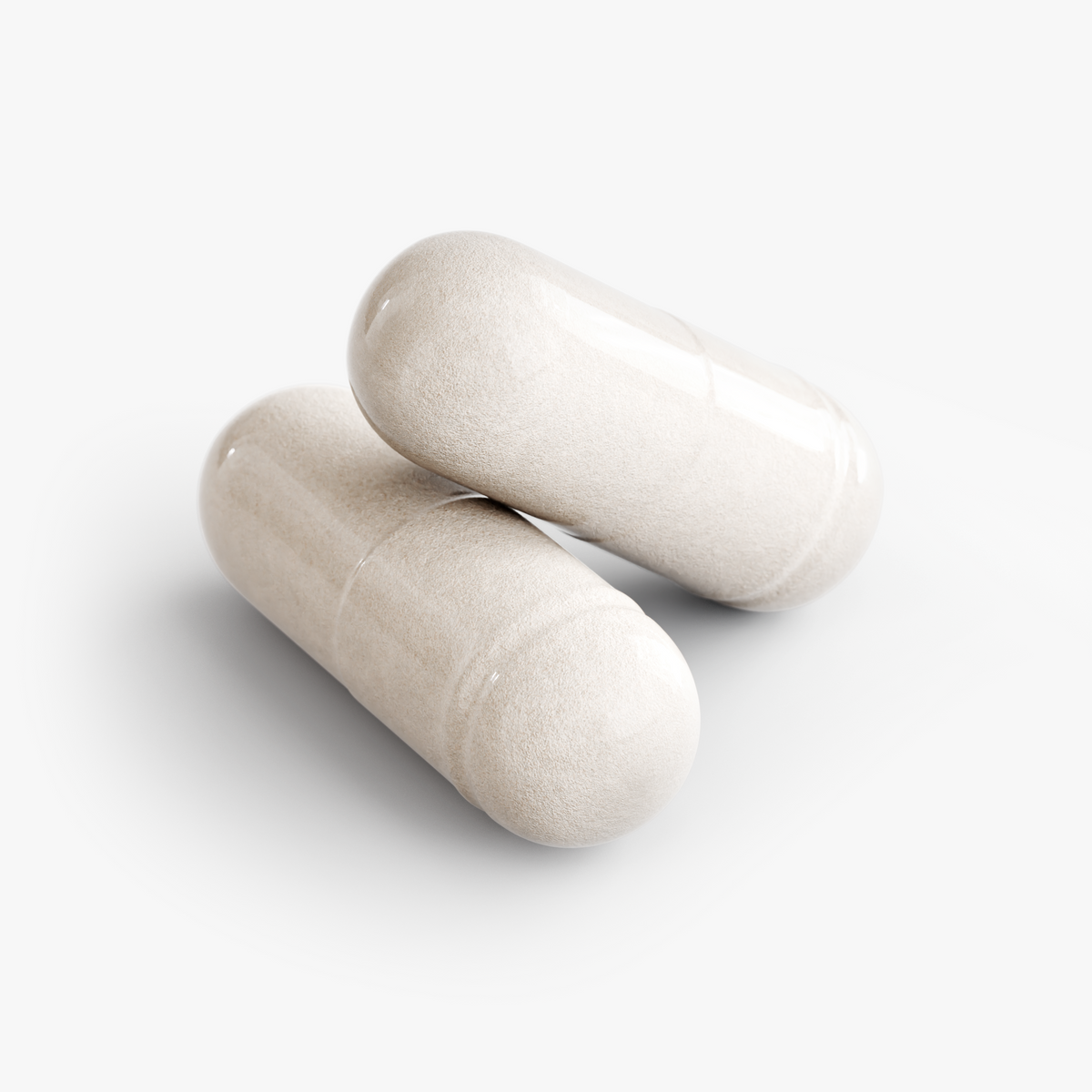 Two glossy, beige Keto BHB capsules stacked on a neutral background, showcasing their smooth finish by nutrima.