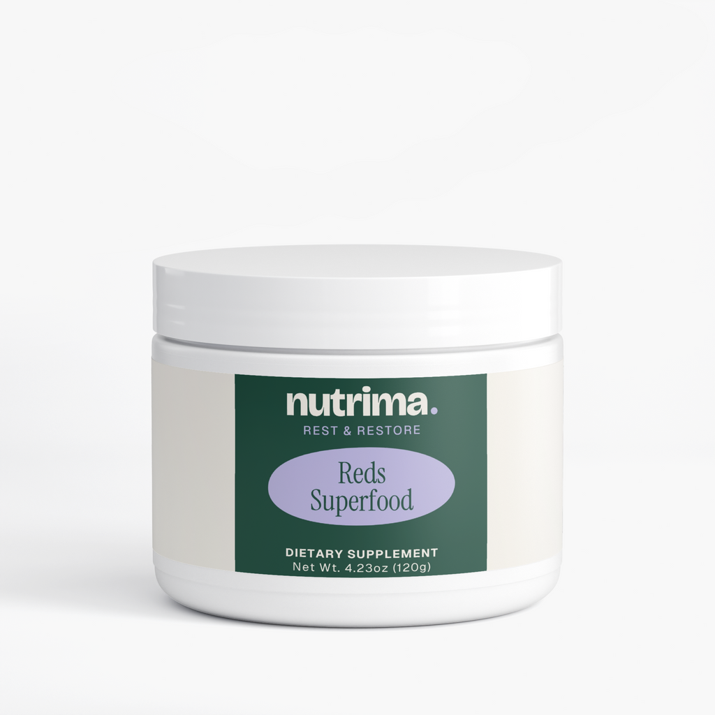 Reds Superfood dietary supplement in a white jar with a green and purple label, by nutrima.