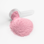 A scoop filled with vibrant pink Energy Powder (Fruit Punch) resting on a surface, showcasing its fine texture by nutrima.
