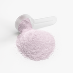 A scoop of light pink Energy Powder (Yuzu Flavor) spills onto a white background, showcasing its fine texture by nutrima.