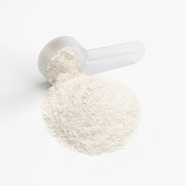 A clear scoop filled with Lychee Splash Energy Powder on a white background, showcasing the pre-workout supplement by nutrima