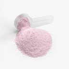 Pink hydration powder sits in a scoop, showcasing its fine texture and color for Intra-Workout Supplements by nutrima.