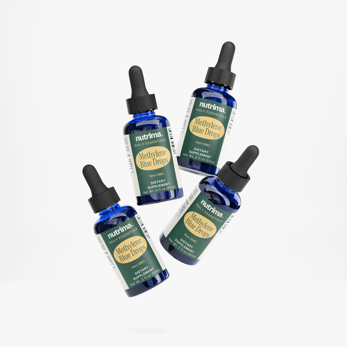 Four blue glass bottles of Methylene Blue Drops, showcasing the label and dropper tops, by nutrima.