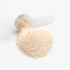 A scoop of Hydration Powder (Lemonade) rests on a mound of fine powder against a clean background by nutrima.