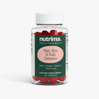 Clear bottle of Hair, Skin & Nails Gummies featuring vibrant red gummies, labeled by nutrima as a dietary supplement.