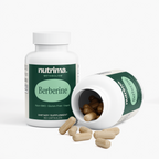 The Berberine dietary supplement by nutrima features capsules spilling from an open bottle, showcasing its vegan formula.