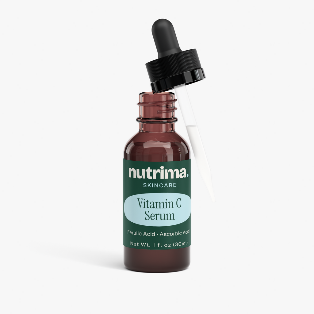 Amber glass bottle of Vitamin C Serum with dropper, highlighting the product name and brand, by nutrima.
