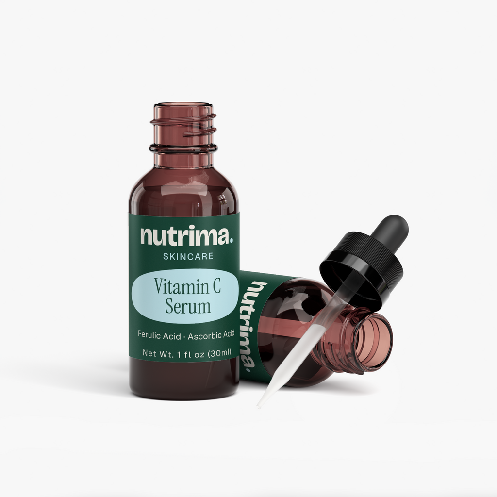 Dark amber bottles of Vitamin C Serum by nutrima, featuring a dropper cap and sleek design, on a white background.