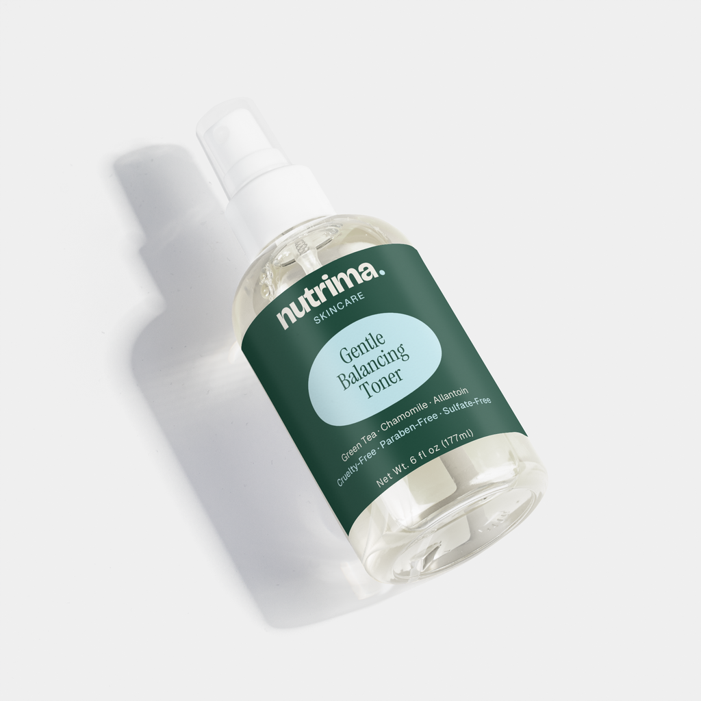 Clear spray bottle of Gentle Balancing Toner showcasing its distinct label and minimalistic design by nutrima.
