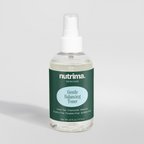 Clear bottle of Gentle Balancing Toner showcasing a green label and spray top, highlighting its calming ingredients by nutrim