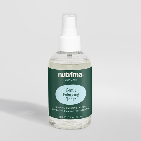 Clear bottle of Gentle Balancing Toner showcasing a green label and spray top, highlighting its calming ingredients by nutrim