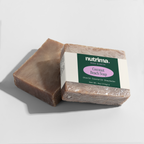 Coconut Beach Soap showcases a natural texture with packaging, highlighting the 4 oz bar by nutrima.
