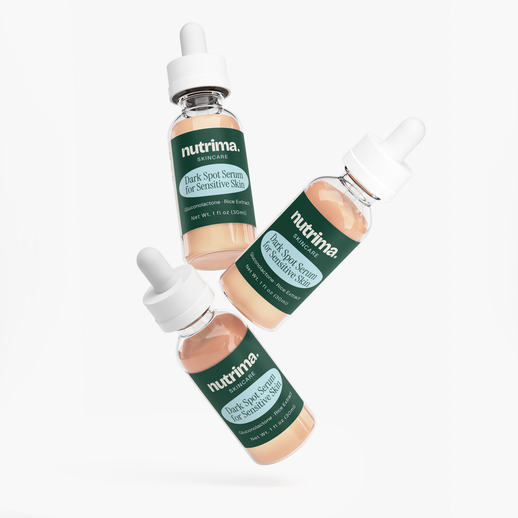 Three bottles of Dark Spot Serum for Sensitive Skin by nutrima, showcasing their clear formula and droppers.
