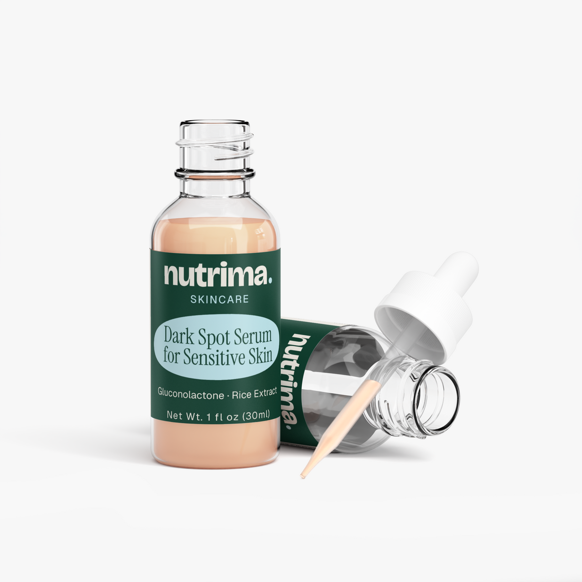 Close-up of the Dark Spot Serum for Sensitive Skin with a dropper, featuring its distinct green label and transparent liquid 