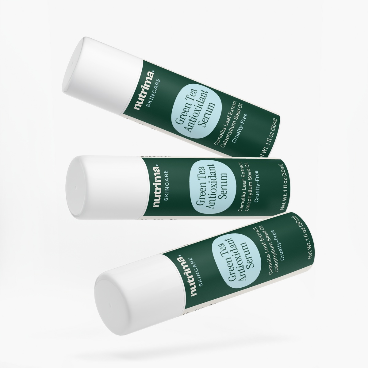 Three angled bottles of Green Tea Antioxidant Serum showcasing the elegant dark green packaging by nutrima.
