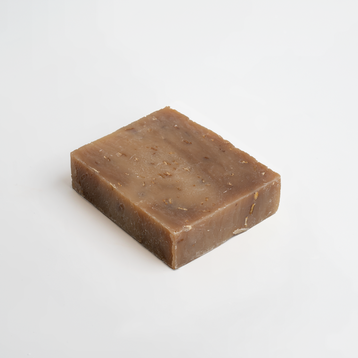 Smooth, rectangular Oat Milk Honey Soap in a warm brown tone, presented on a white background by nutrima.