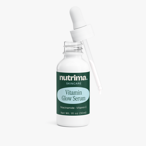 The Vitamin Glow Serum features a sleek white bottle with a dropper, showcasing its nourishing formula by nutrima.