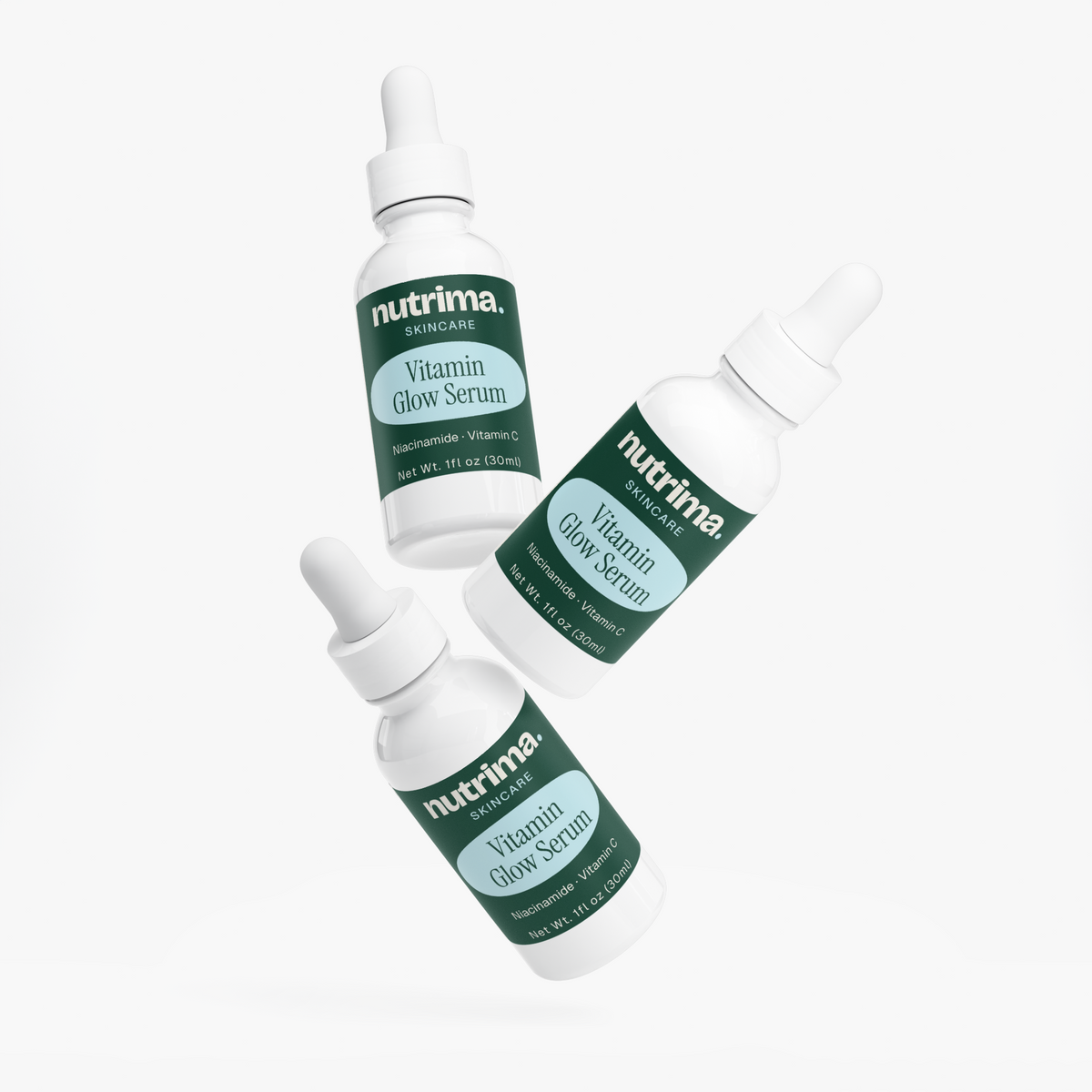 Three bottles of Vitamin Glow Serum by nutrima, featuring a vibrant green label and dropper tops against a white background.