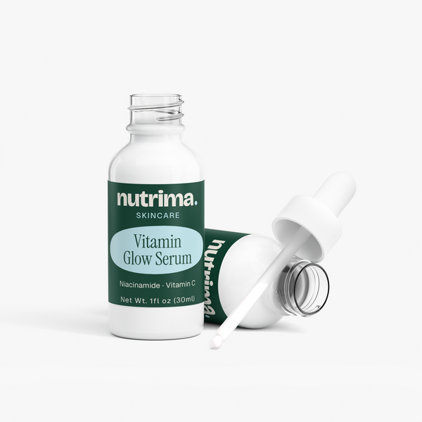 Two bottles of Vitamin Glow Serum with droppers, showcasing a sleek design and green label by nutrima.