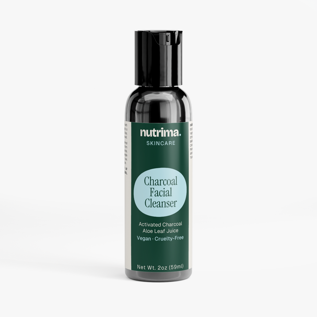 Black pump bottle of Charcoal Facial Cleanser, featuring a green label and silver accents, by nutrima.