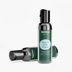 Two bottles of Charcoal Facial Cleanser with a dark green design, highlighting its vegan and cruelty-free qualities, by nutri