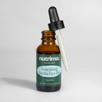 Amber glass bottle with a dropper featuring Nourishing Jojoba Face Oil by nutrima, showcasing its squalane content.