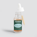 Close-up of the Dark Spot Serum for Normal Skin, highlighting its amber liquid and dropper, packaged by nutrima.