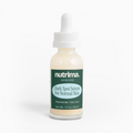Light-colored bottle of Dark Spot Serum for Normal Skin by nutrima, featuring a dropper and clear branding.
