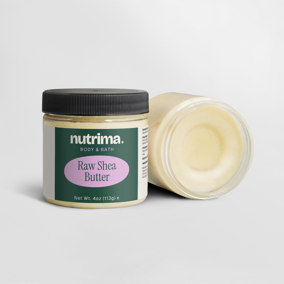 Transparent jar of Raw Shea Butter with a black lid, showcasing its creamy texture, by nutrima.