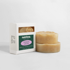 Exfoliating Luffa Bar with visible luffa texture, packaged in a white box, by nutrima.