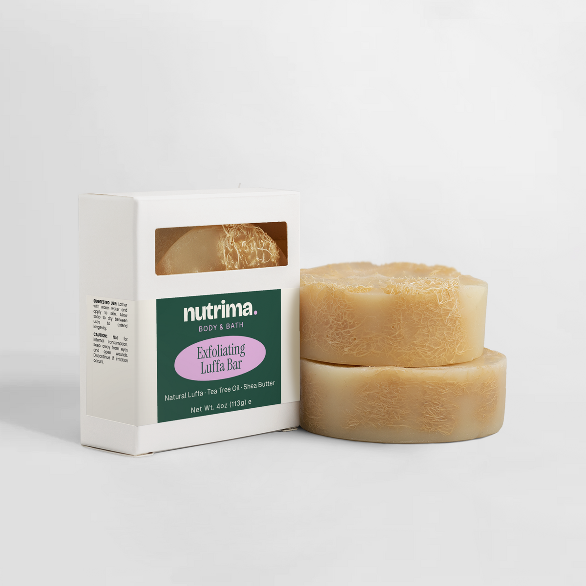 Exfoliating Luffa Bar with visible luffa texture, packaged in a white box, by nutrima.