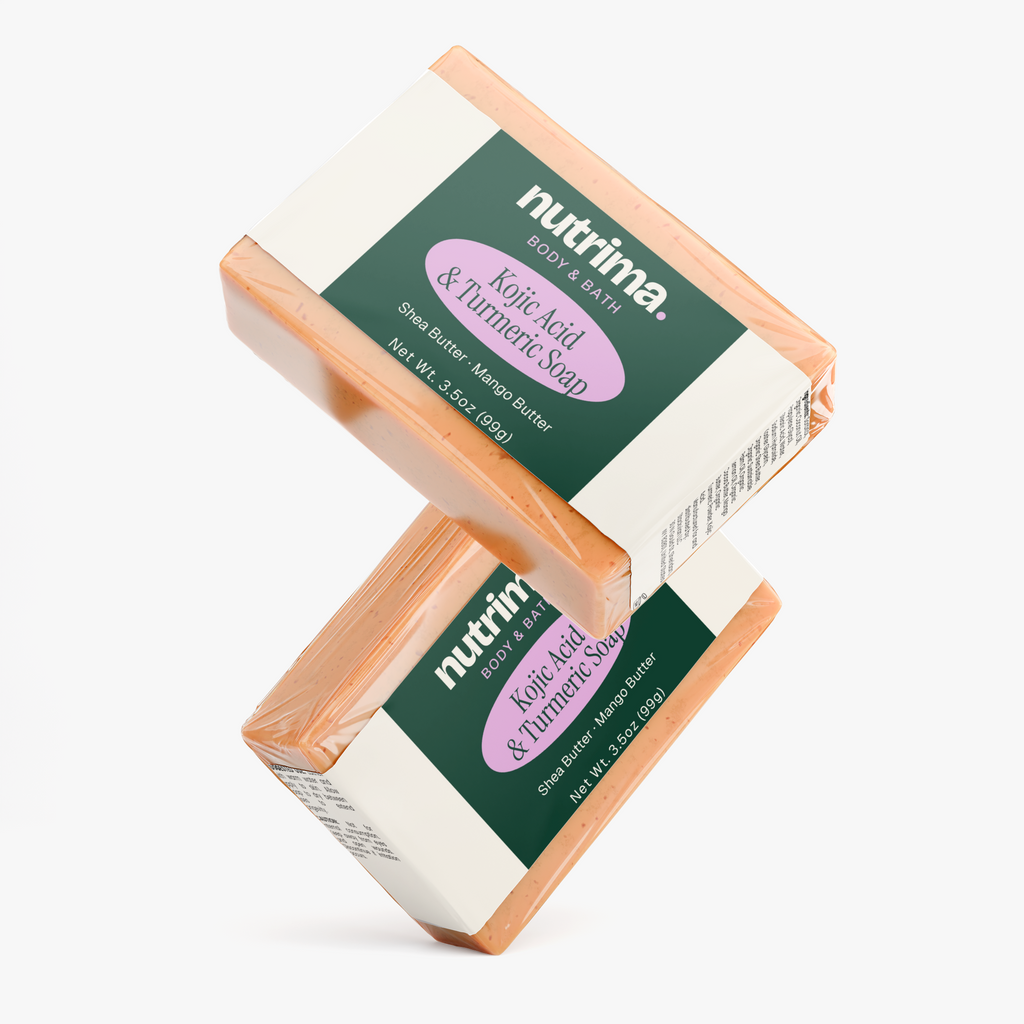 Two bars of Kojic Acid & Turmeric Soap in peach packaging, showcasing the product by nutrima.