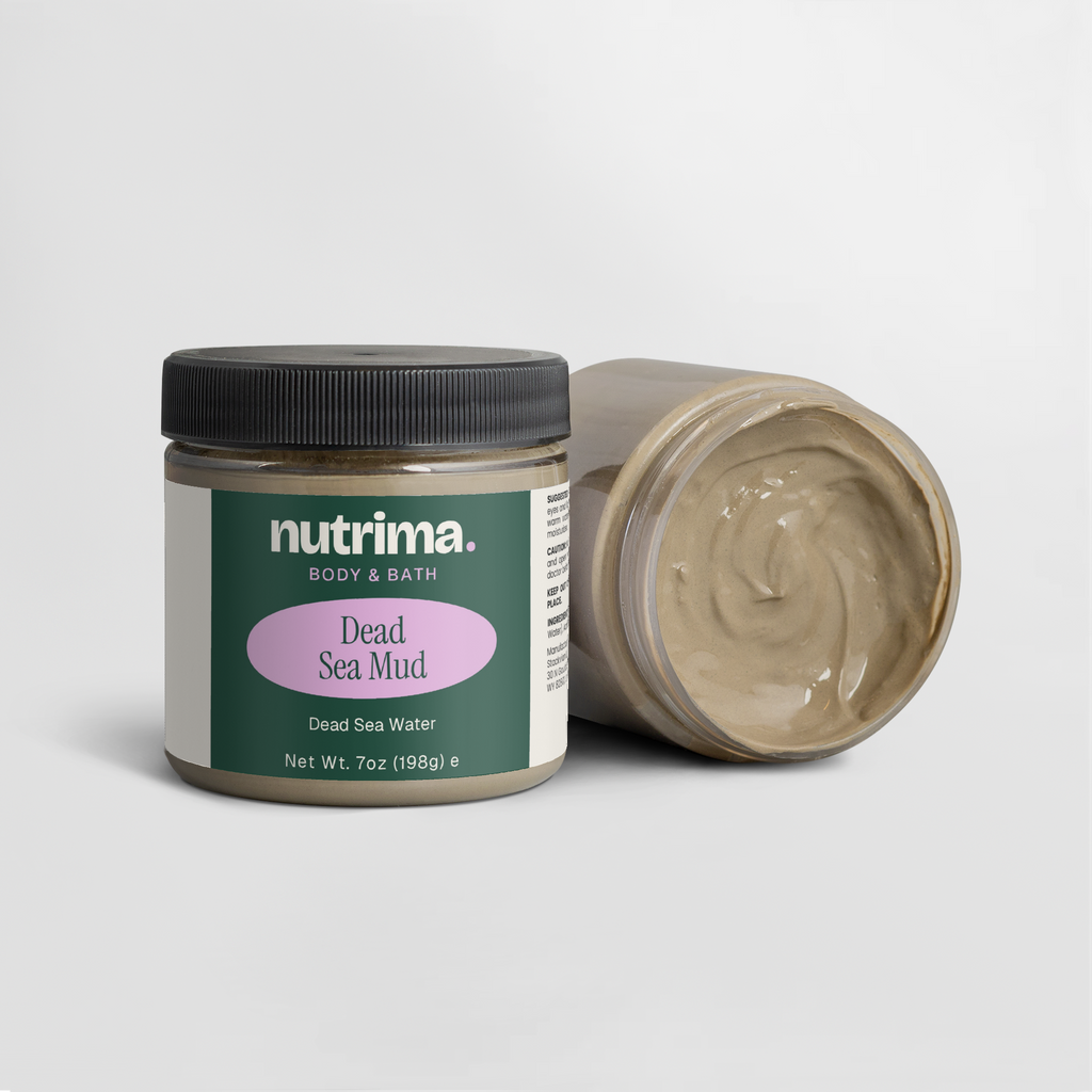 Lid off jar of Dead Sea Mud showing creamy texture, with packaging design visible, by nutrima.