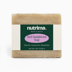 Rich Sandalwood Soap with a creamy texture and distinctive packaging, featuring ingredients like olive oil and shea butter, b
