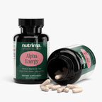 Black bottle of Alpha Energy dietary supplement with capsules spilling out, featured by nutrima.