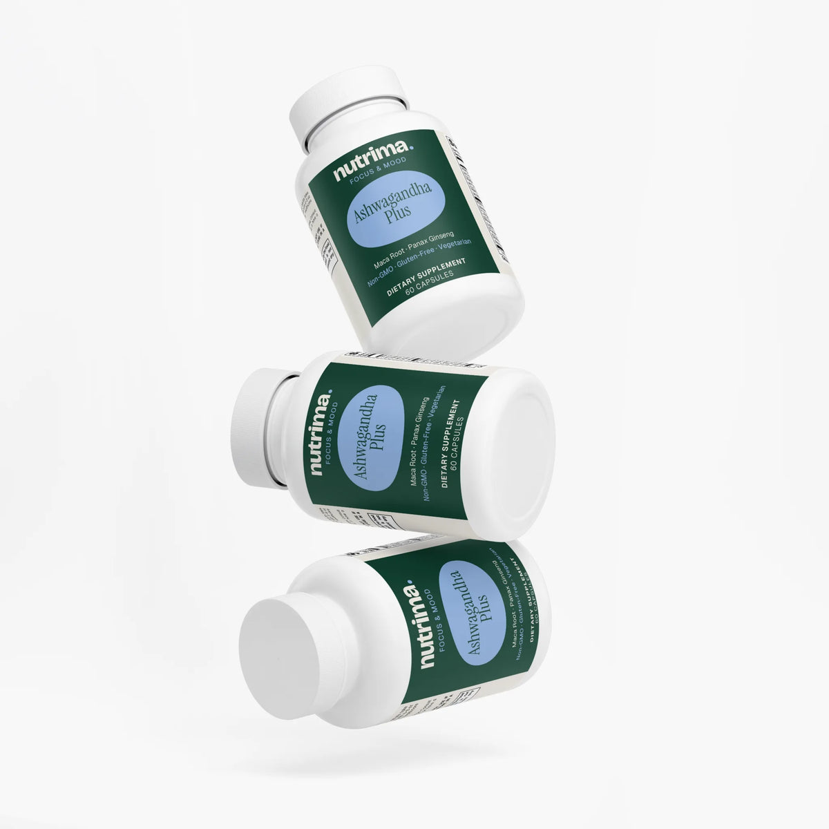 Three bottles of Ashwagandha Plus displayed at an angle, featuring a green label and white caps by nutrima.