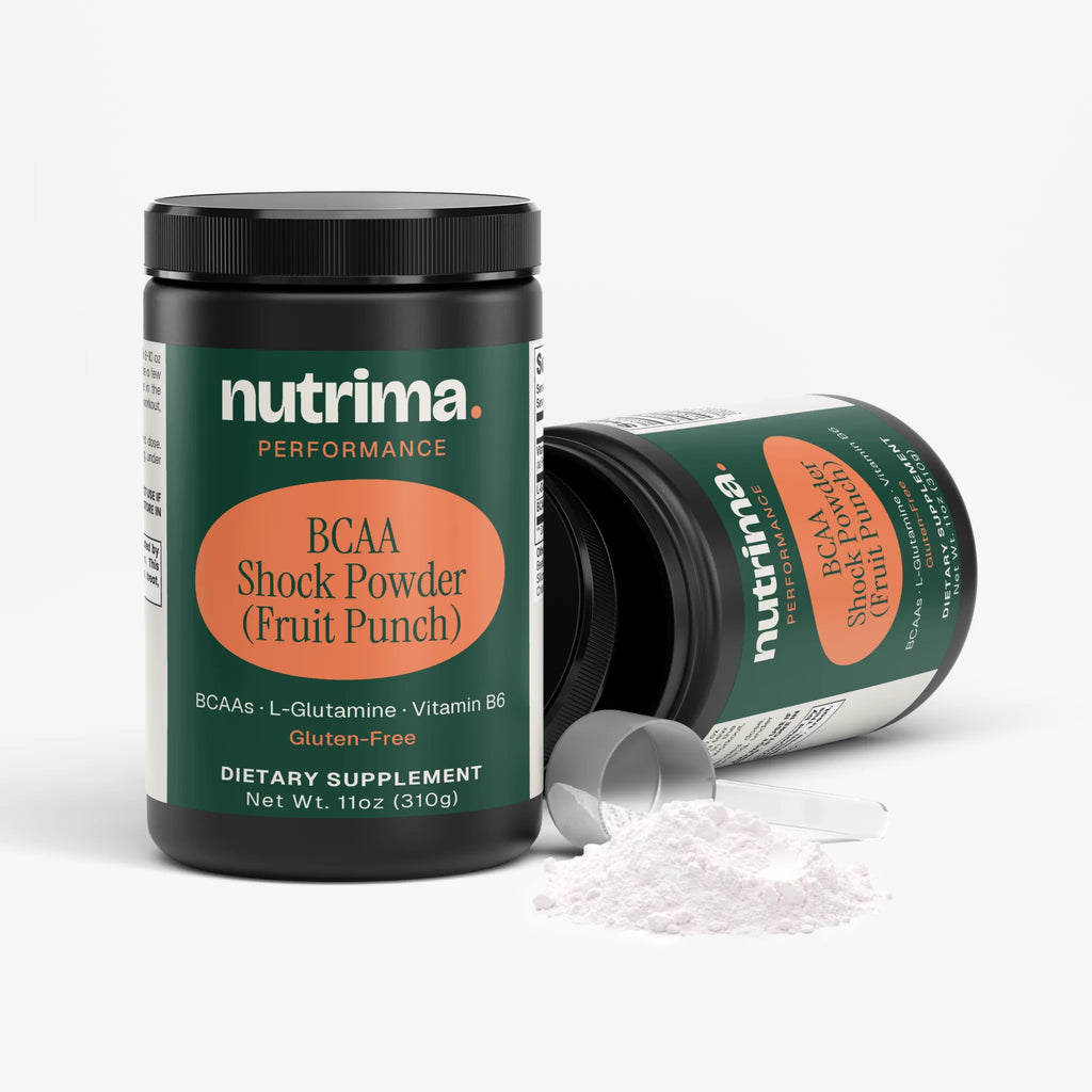 Close-up of BCAA Shock Powder (Fruit Punch) with scoop and powder spilled, showcasing the packaging by nutrima.