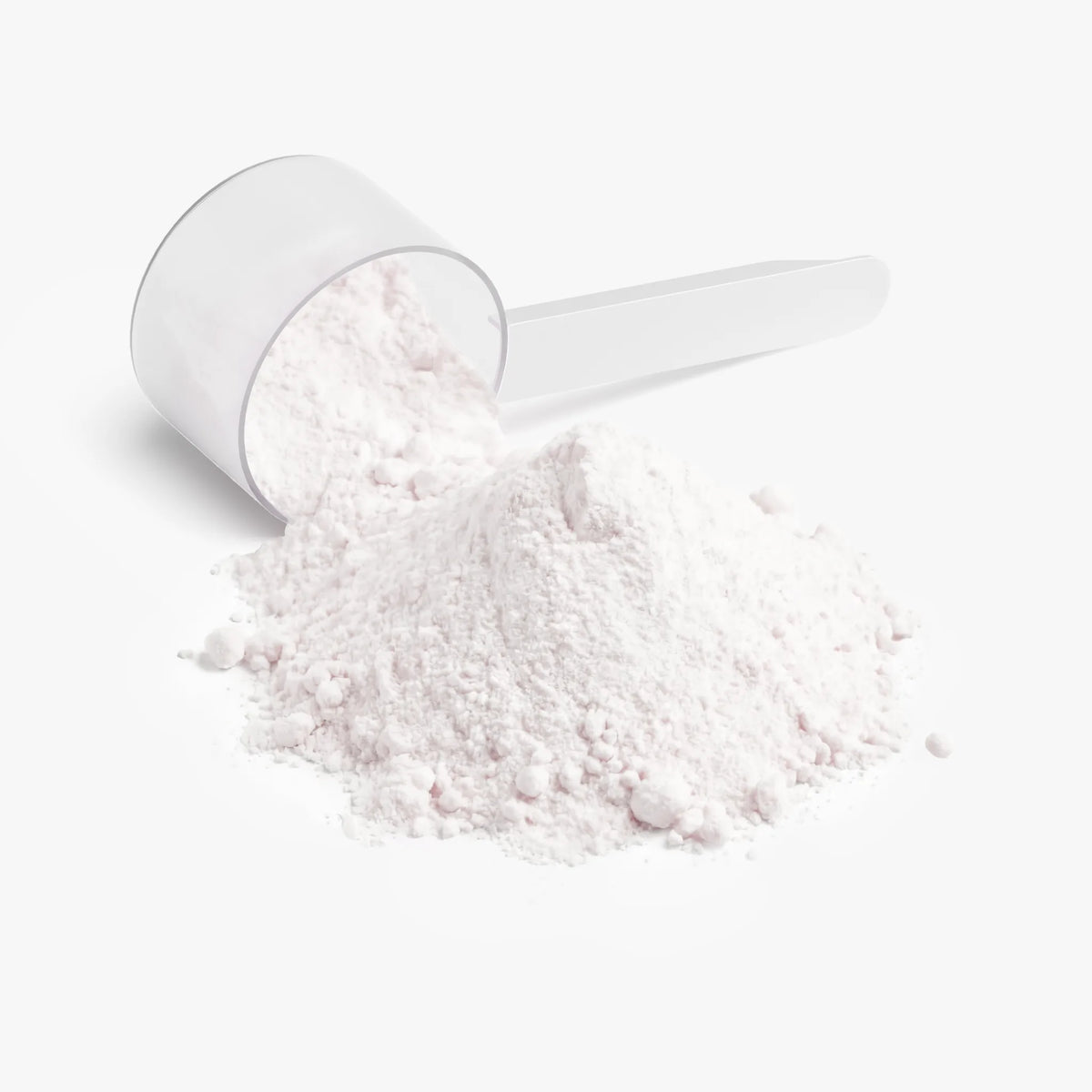 A measuring scoop filled with light pink BCAA Shock Powder (Fruit Punch) by nutrima sits beside a mound of the powder.