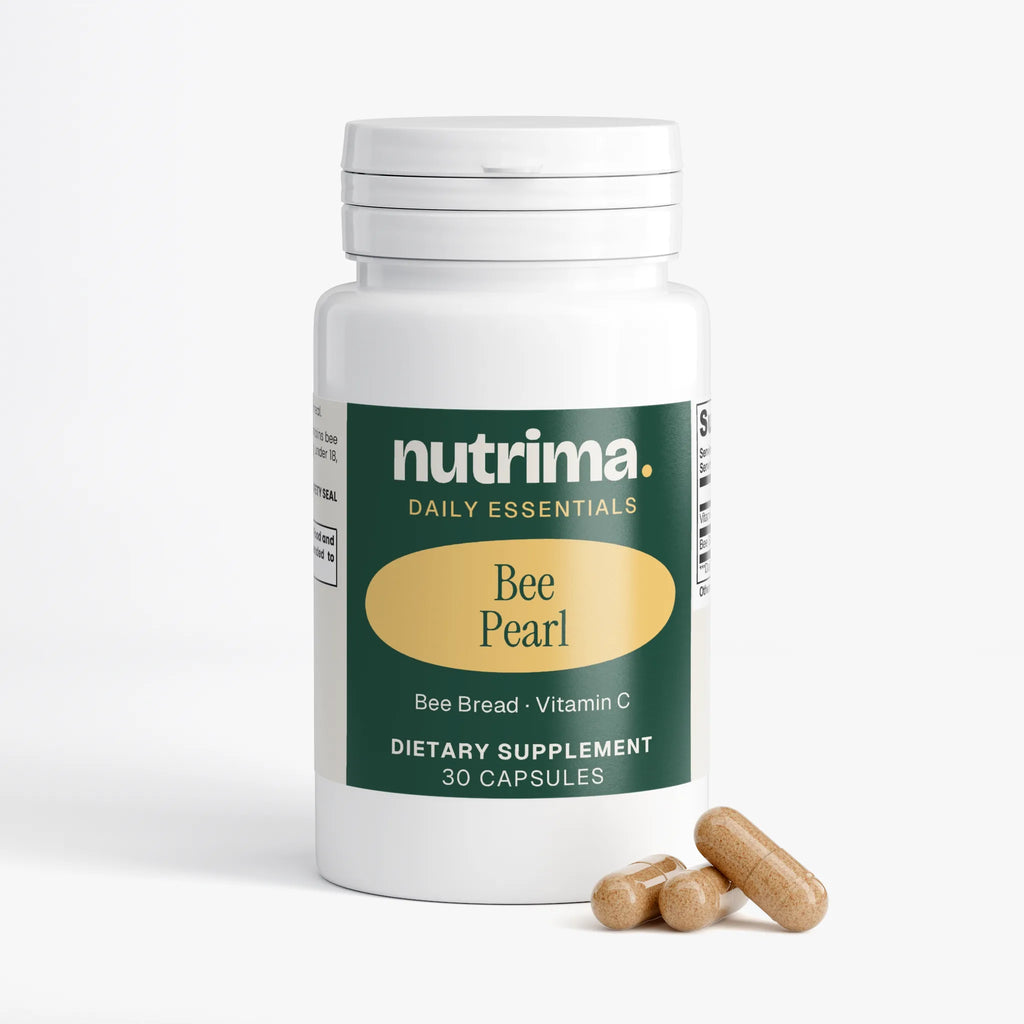 Close-up of the nutrima. Bee Pearl bottle with two capsules showing, labeled as a dietary supplement.