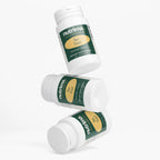 Three bottles of Bee Pearl dietary supplement with green and white packaging, showcasing a floating arrangement by nutrima.