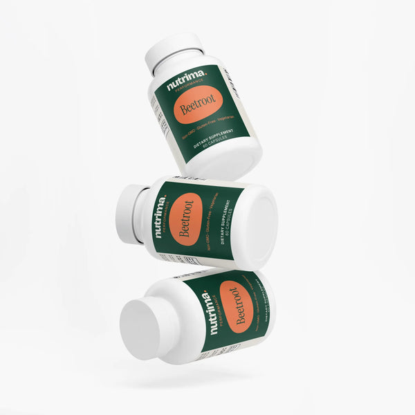 Three bottles of Beetroot dietary capsules in a floating arrangement, featuring a green and orange design by nutrima.