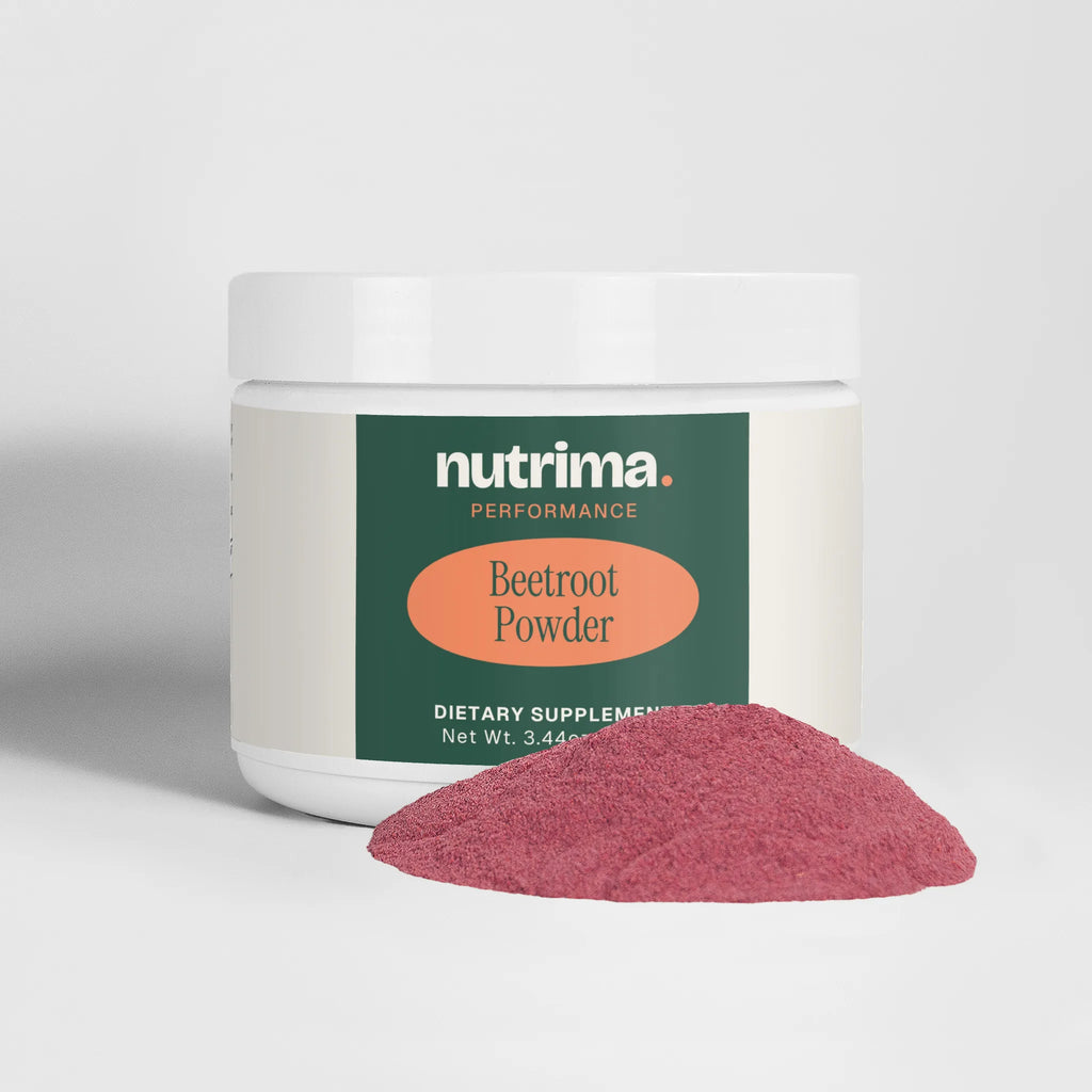 Beetroot Powder in a white container with pink powder spilled, highlighting its vibrant color by nutrima.