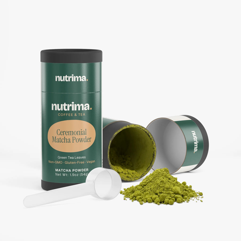 Glistening green Ceremonial Matcha Powder spills from an open canister beside a measuring scoop by nutrima.