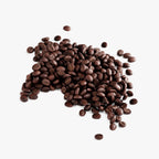 Medium roast Cherry Zest Coffee beans spill across a clean surface, showcasing their rich, dark color by nutrima.