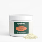 White jar of Colostrum Powder with a green label, accompanied by a scoop of powder, by nutrima.