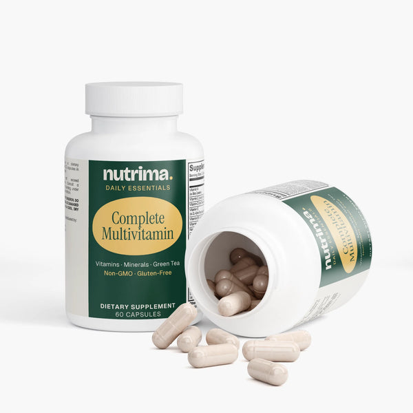 Complete Multivitamin by nutrima shown in an open bottle with capsules spilling out, highlighting its dietary supplement form