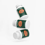 Three angled jars of CoQ10 Ubiquinone dietary supplement, showcasing the green label design by nutrima.